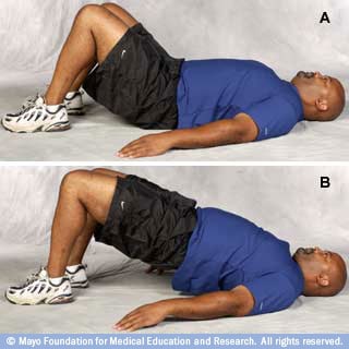 Photo of man in bridge position 
