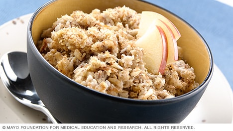 Oatmeal topped with wheat germ and apple