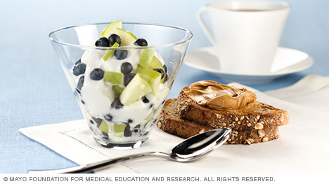 Yogurt with fresh fruit, whole-grain toast with peanut butter and coffee