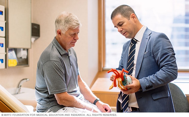Mayo Clinic expert advising a patient
