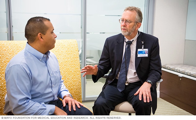 A doctor consulting with a patient