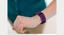 Woman wearing an activity tracker on her wrist