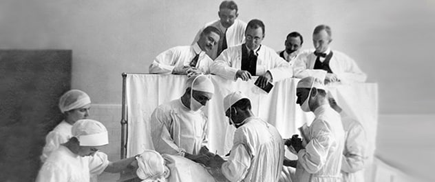 Historical photo of an early Mayo Clinic surgery being performed.