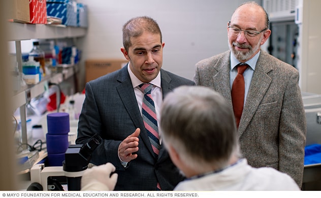 Drs. Janus and Kasperbauer collaborate to conduct head and neck cancer research.