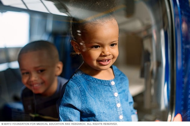 Two children smiling