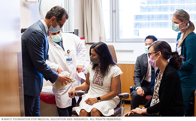 Specialists examine a patient at Mayo Clinic’s Oculofacial Plastics Clinic, Rochester, Minnesota.