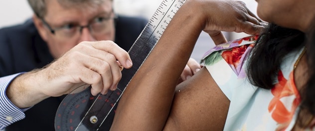 A Mayo Clinic surgeon takes a measurement during research.