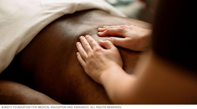 Massage therapy is used to reduce pain and tension.