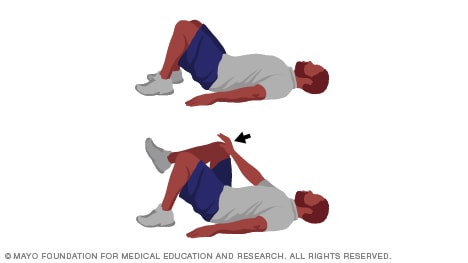 Person doing single-leg abdominal press core-strength exercise
