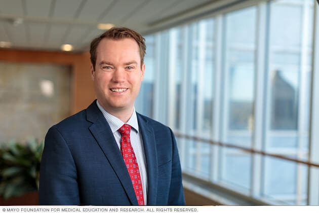 A Mayo Clinic Orthopedic Oncology surgeon smiles in greeting.