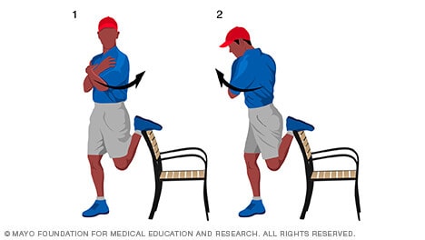 Persona haciendo estiramientos de los cuádriceps