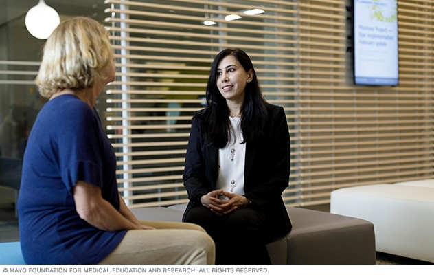 A gastroenterologist at Mayo Clinic in Minnesota refers to a screen image during a patient consultation.