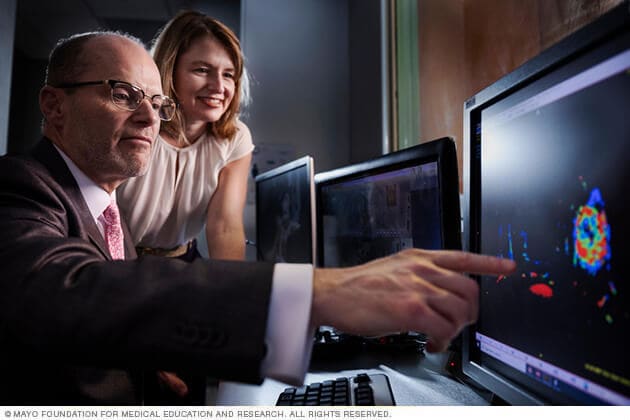 Mayo Clinic breast surgeons refer to digital imagery to discuss their research. 