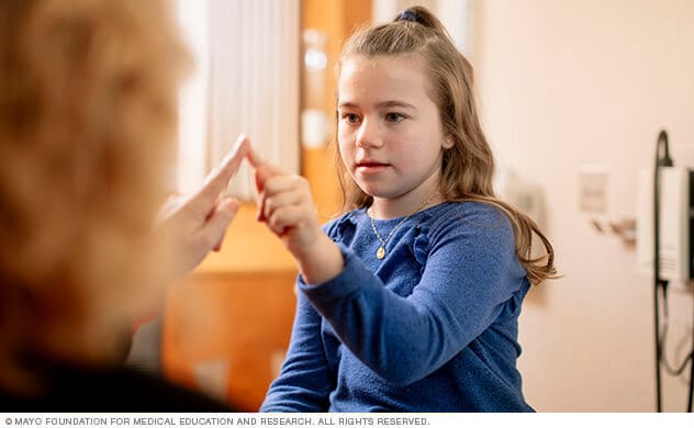 A Mayo Clinic specialist evaluates a child.