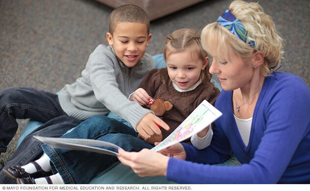 A specialist works with children at Mayo Clinic's Department of Psychiatry and Psychology.