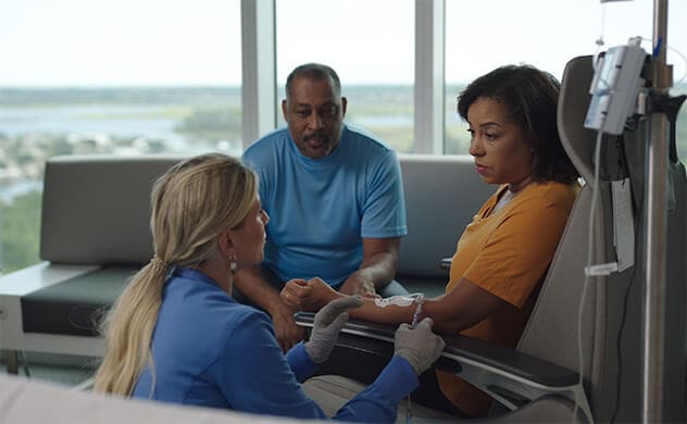 A Mayo Clinic healthcare professional cares for a patient.