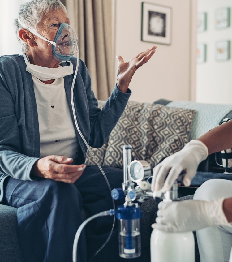 Older woman wearing an oxygen mask